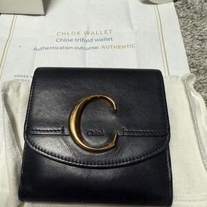 Authentic Chloe bronze emblem wallet, mint condition, full inclusion